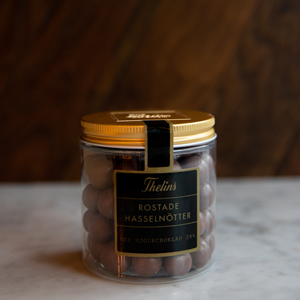 Hasselnötter i ljus choklad